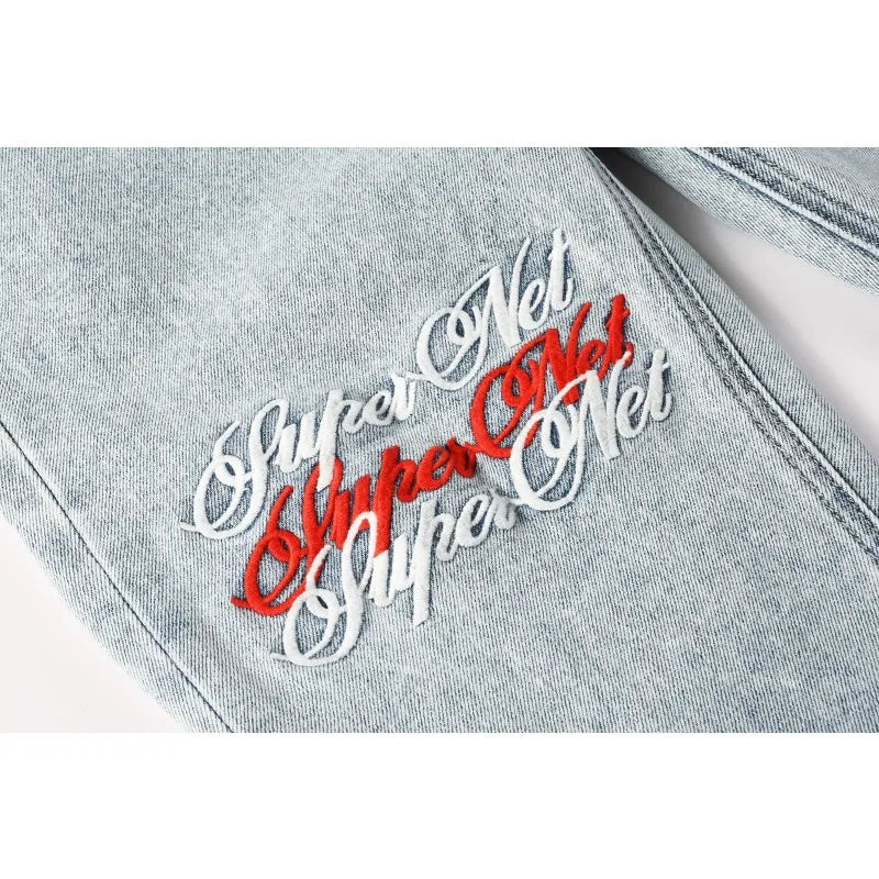 2026 New Men Jeans Fashion Trends Distressed Rose Embroidered Logo Stretch Skinny Button Jeans Pants